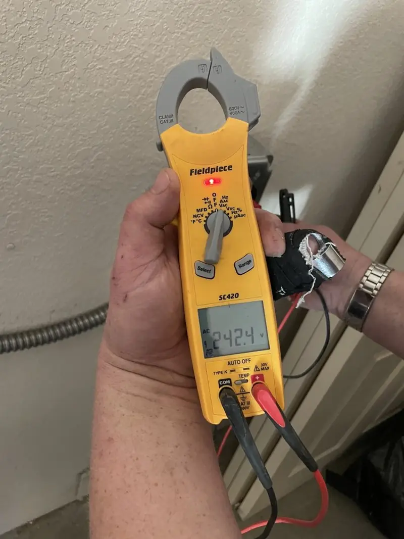Voltage testing with clamp meter during Hot Tub / Pool Electrical Wiring in Middletown